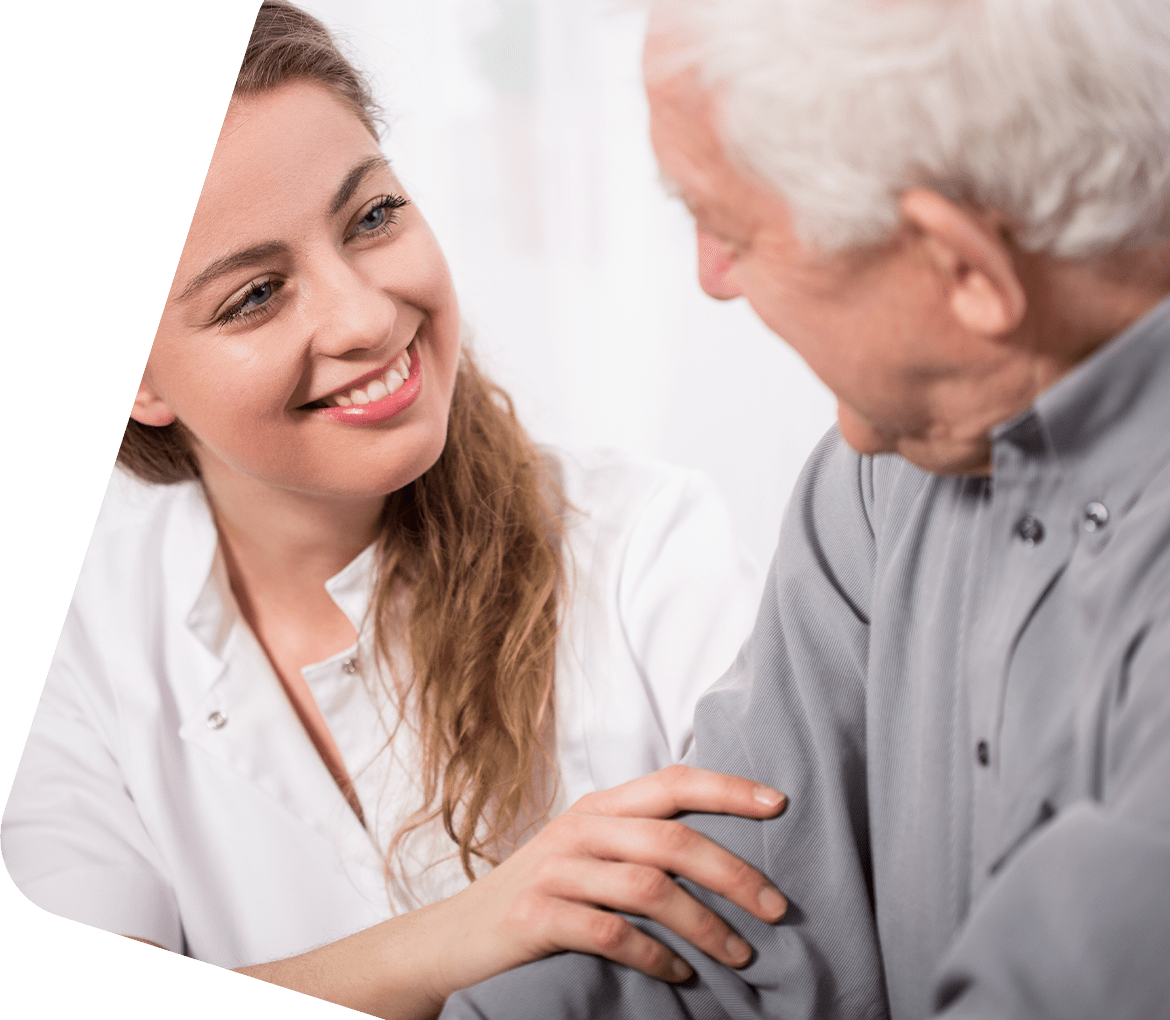 nurse caring for elderly man